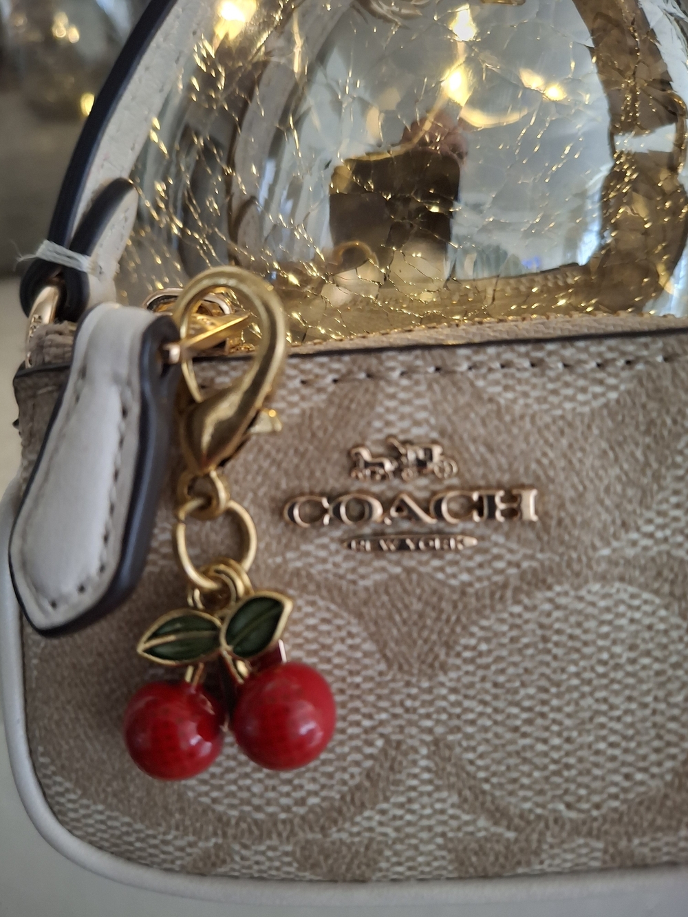 Coach Beige Signature Mini Bag with Red Cherry Charm - Picture 2 of 4